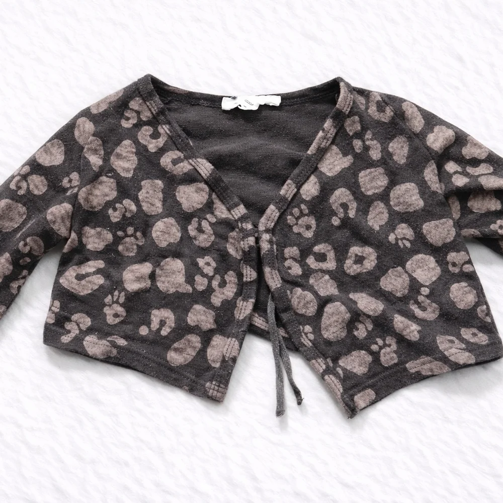 Carter's Brown Leopard Cardigan with Blue Jeans